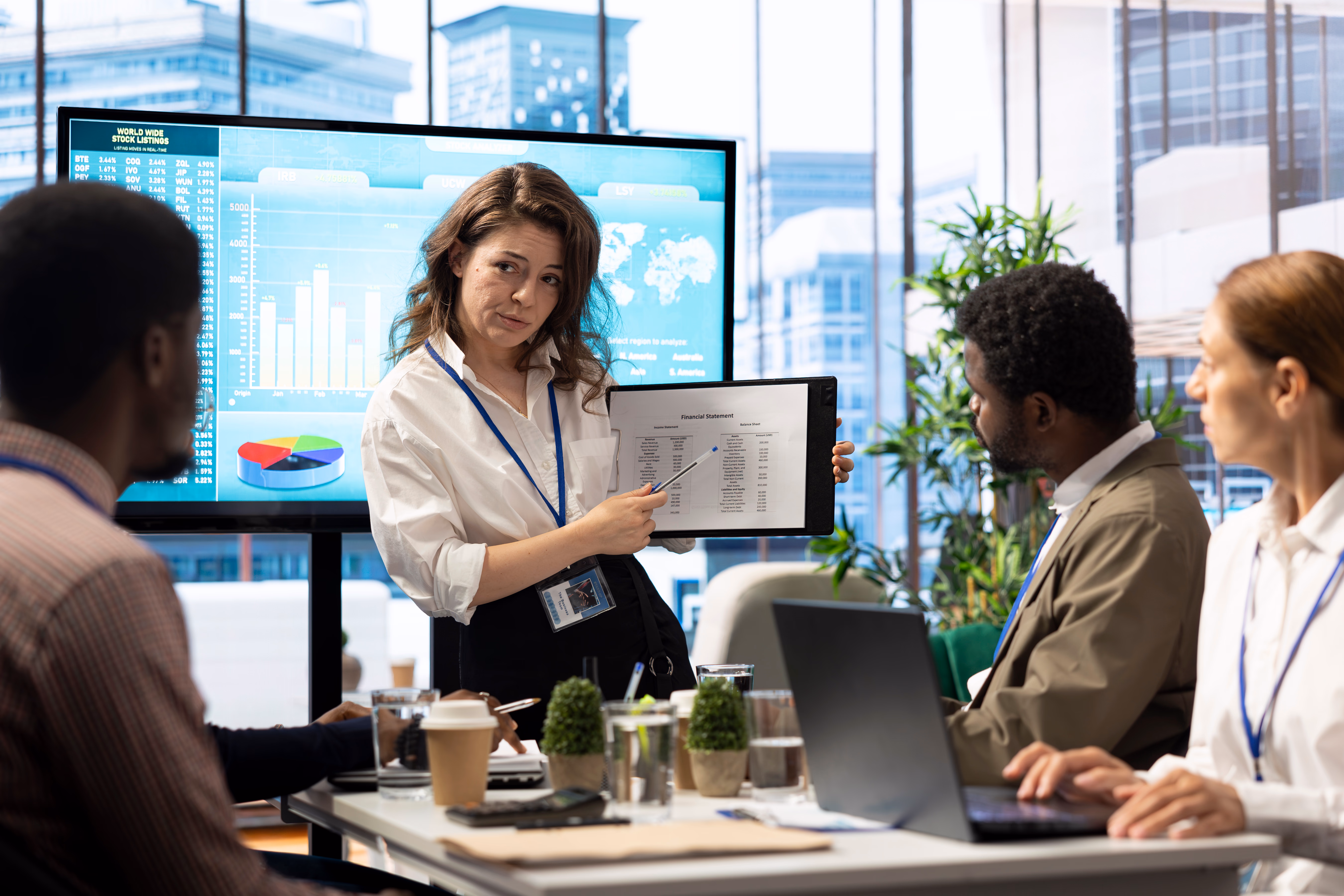 Accounting manager reviewing budget numbers and compliance documentation.